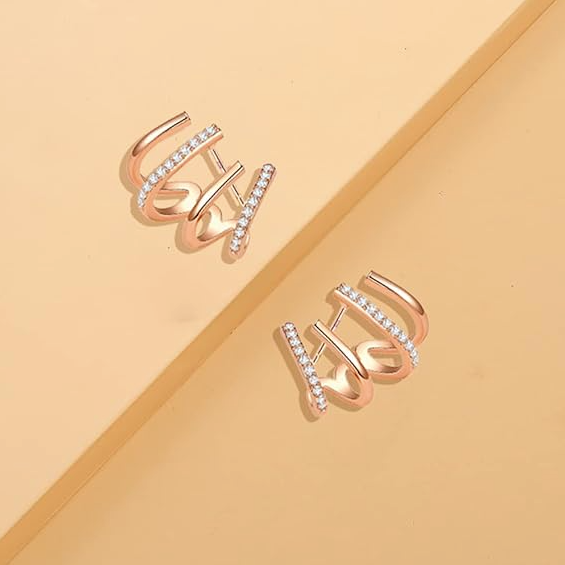 Boucles d’oreilles griffe plaquées or avec zircons
