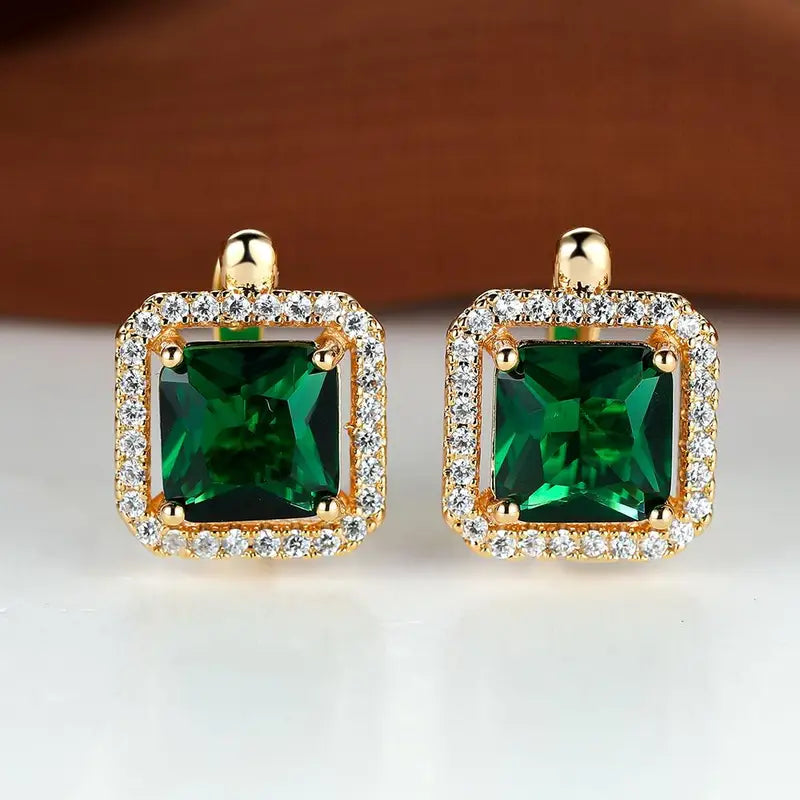 Boucles d’oreilles en or avec émeraude et zircon