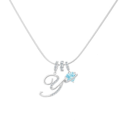 Collier avec pendentif cœur initial