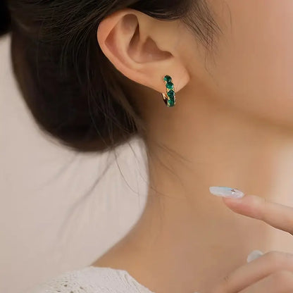 Boucles d’oreilles en or avec pierres délicates