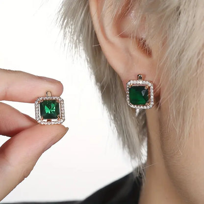 Boucles d’oreilles en or avec émeraude et zircon