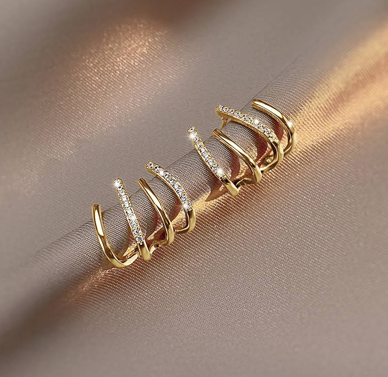 Boucles d’oreilles griffe plaquées or avec zircons