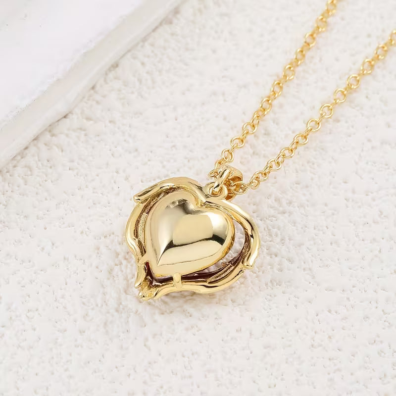Collier Cœur Rubis Étreinte Angélique