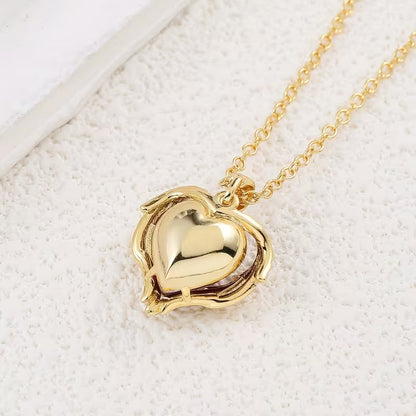 Collier Cœur Rubis Étreinte Angélique