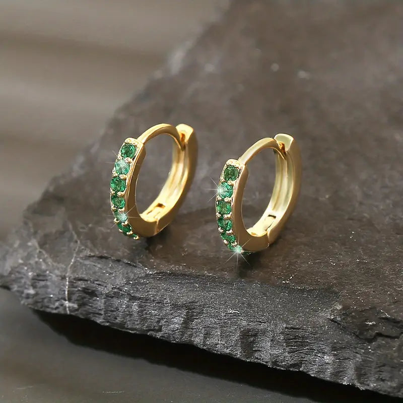 Boucles d’oreilles en or avec pierres délicates