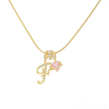 Collier avec pendentif cœur initial