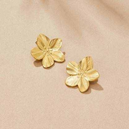 Boucles fleur or