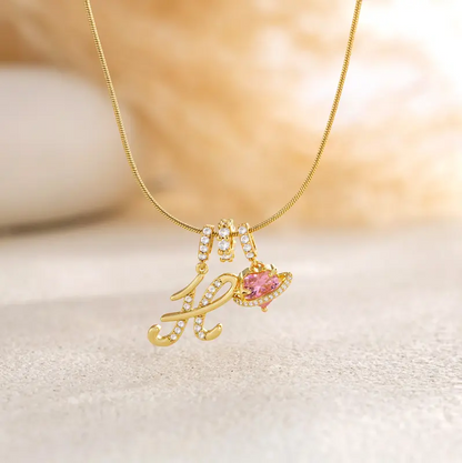 Collier avec pendentif cœur initial